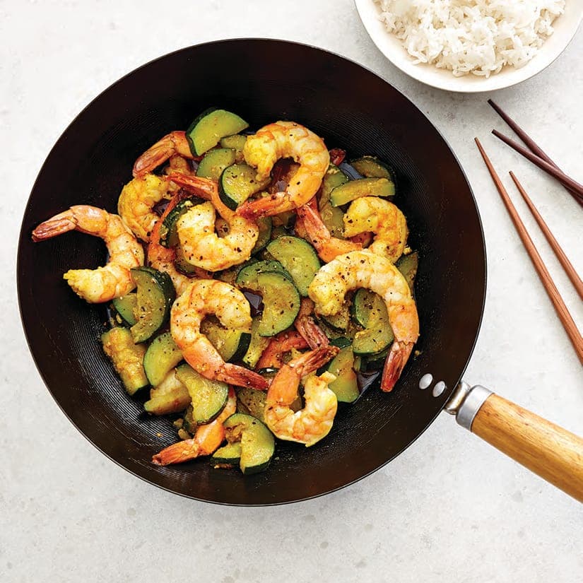 Sauté de crevettes et de courgettes au cari